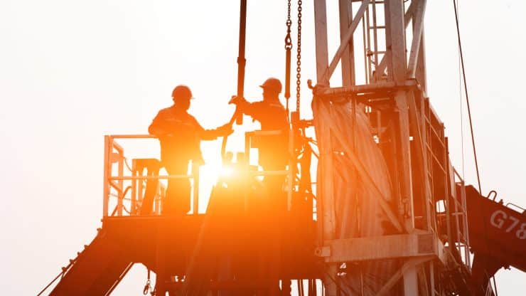 Oil drilling exploration the oil workers are working Oil drilling exploration the oil workers are working